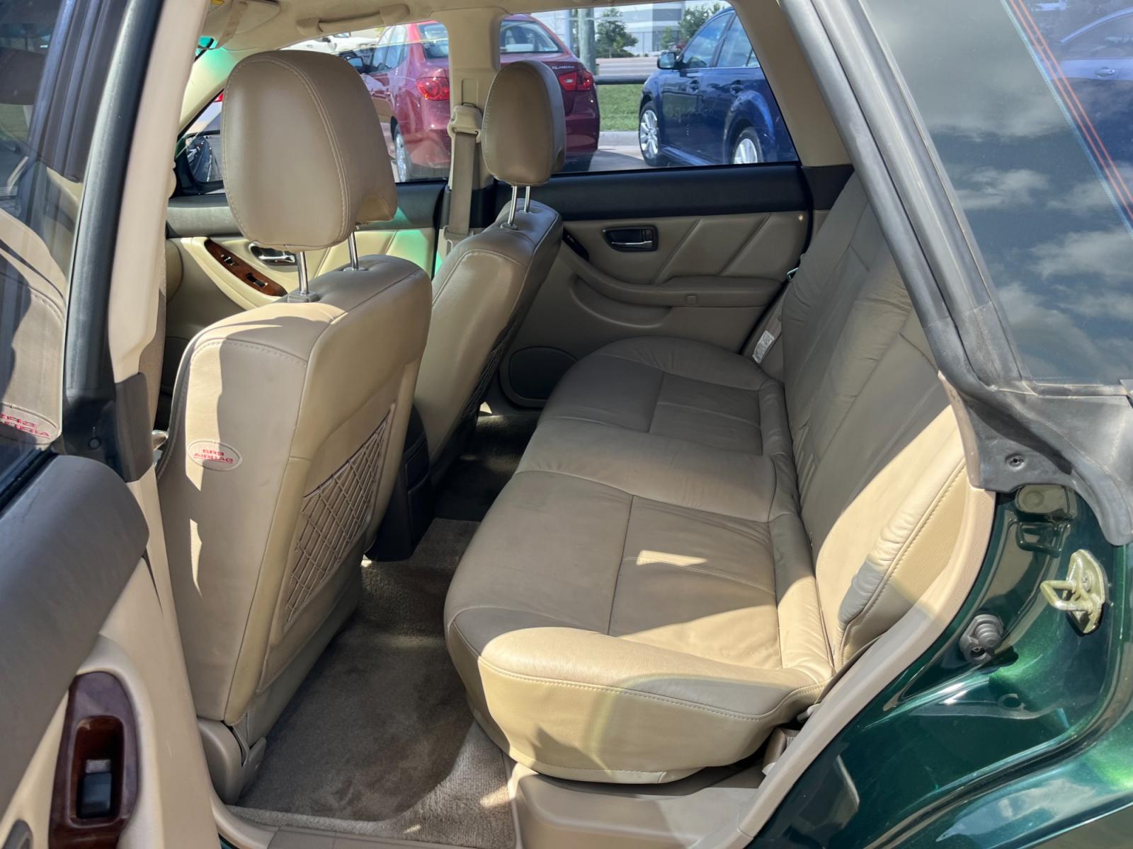 2003 green /TAN Subaru Outback Limited Wagon (4S3BH686737) with an 2.5L H4 SOHC 16V engine, 5-Speed Manual Overdrive transmission, located at 14700 Tomball Parkway 249, Houston, TX, 77086, (281) 444-2200, 29.928619, -95.504074 - Photo #9